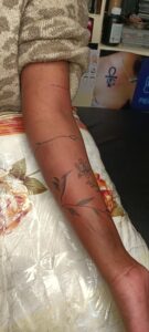 Arm tattoos in Kenya - Tattoo Lust Studio