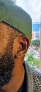 Ear piercing inside our tattoo and piercing shop in Nairobi