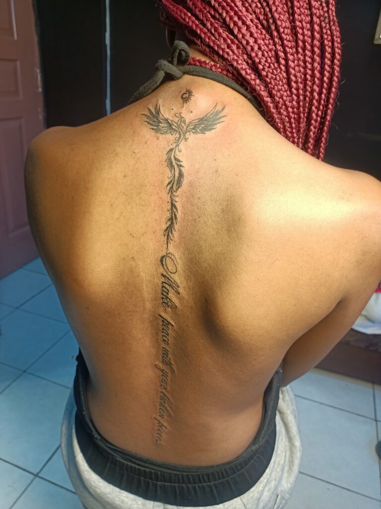 Spine tattoo in Kenya
